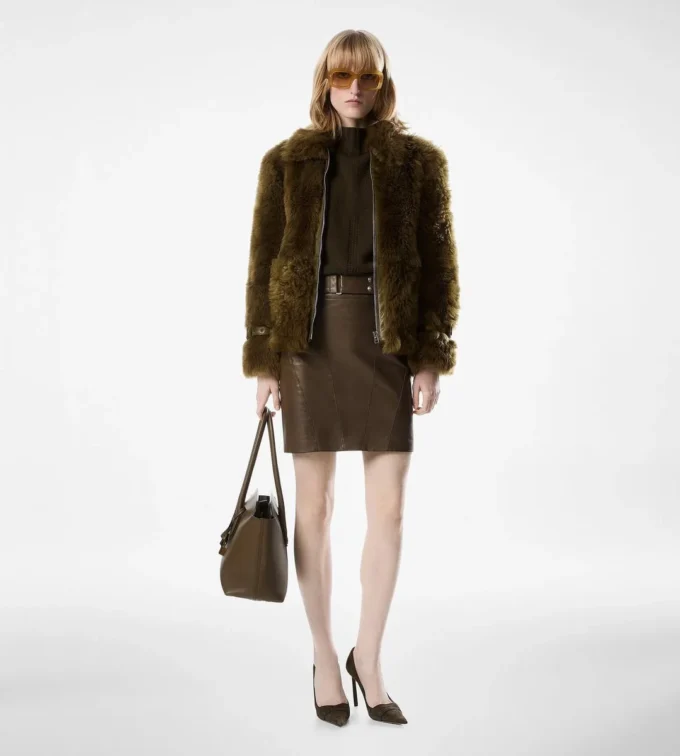 Blouson en peau lainée avec détails en cuir Blouson en peau lainée avec détails en cuir