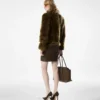 Blouson en peau lainée avec détails en cuir Blouson en peau lainée avec détails en cuir