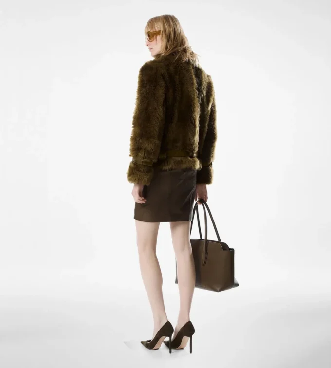 Blouson en peau lainée avec détails en cuir Blouson en peau lainée avec détails en cuir