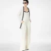 Cardigan mi-long en piqué mérinos avec bordures en satin Cardigan mi-long en piqué mérinos avec bordures en satin