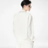 Chemise de pyjama en twill de soie avec passepoil et logo TF brodé ton sur ton