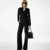Pantalon large en soie plissé Pantalon large en soie plissé