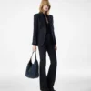 Veste à revers en pointe et boutonnage simple