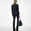 Veste à revers en pointe et boutonnage simple