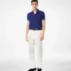Polo en cachemire et soie à passepoil contrasté