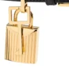 Sandales à bout pointu en cuir brillant avec cadenas Sandales à bout pointu en cuir brillant avec cadenas