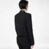 Veste de smoking courte à revers châle et boutonnage simple bicolore Veste de smoking courte à revers châle et boutonnage simple bicolore