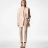 Veste à double boutonnage et revers en pointe