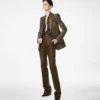 Veste à revers en pointe et boutonnage simple en jacquard croco Veste à revers en pointe et boutonnage simple en jacquard croco